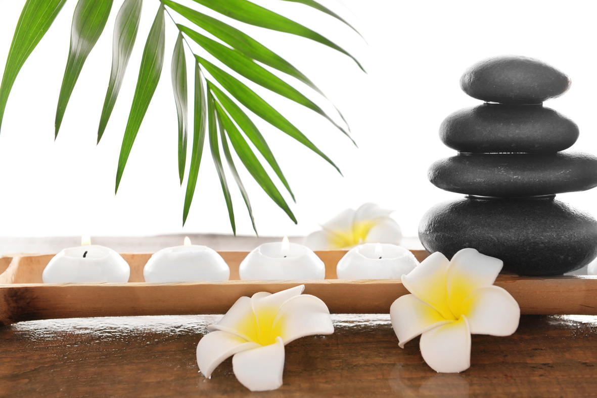 Spa Stones with Candles, Plumeria, and Bamboo