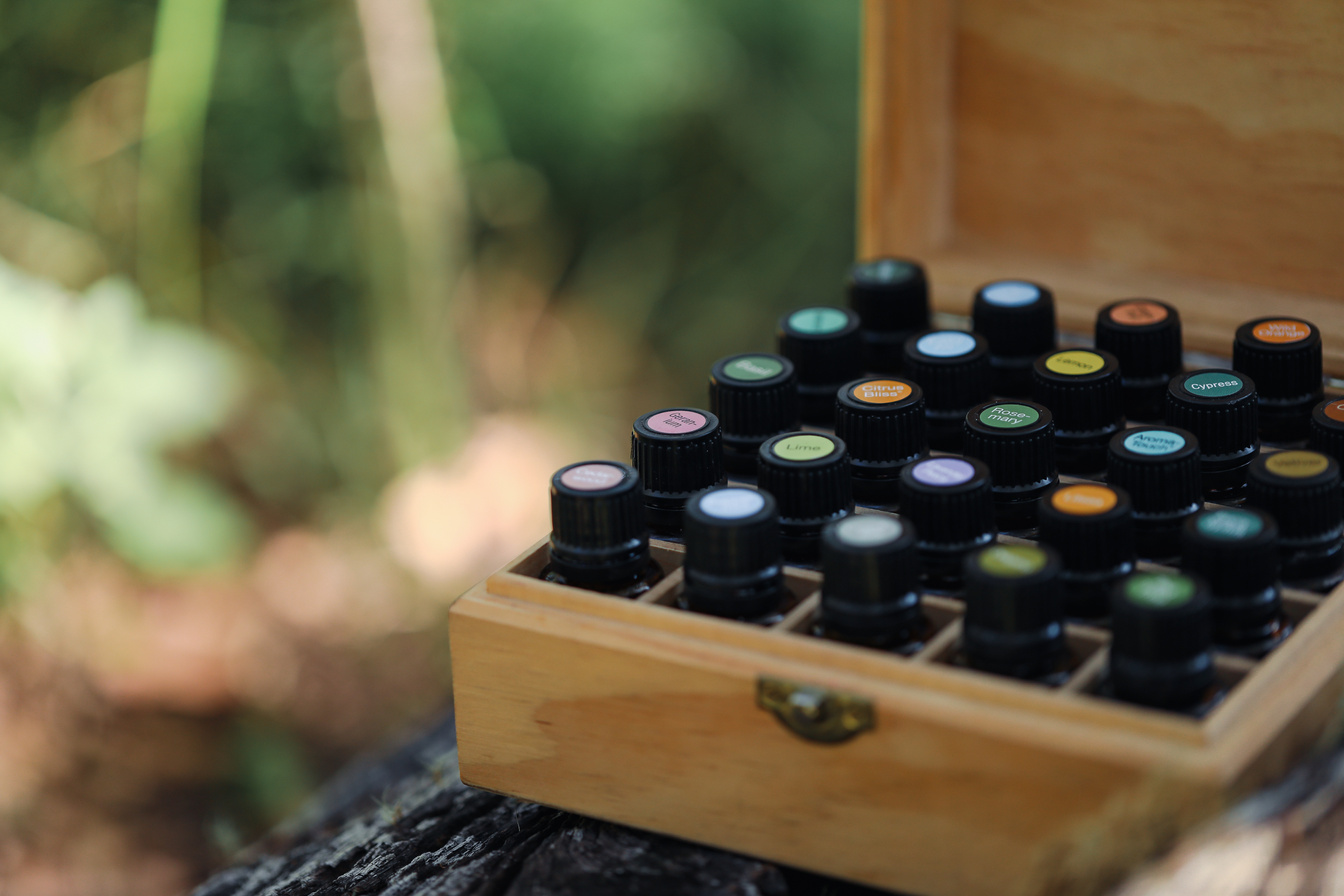 Essential Oil Bottles in a Wooden Storage Box